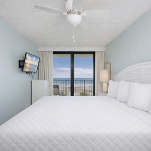 Awaken to stunning coastal views from your cozy king bed, where you can plan your day while soaking in the serene vibe