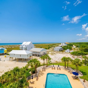 Relax in this vibrant coastal community just steps from the beach on your next vacation to The Dunes in Fort Morgan