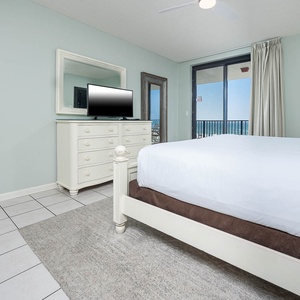 Listen to the soothing sounds of the beach and catch your favorite show from the king bed in the master suite