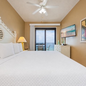 Nighttime breezes and coastal sounds welcome you in the master suite with a king bed and a TV for streaming