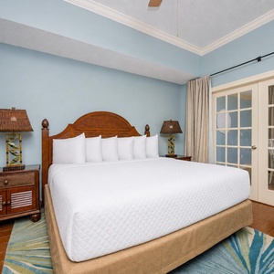 Unwind after a day at the beach in this elegant king master suite surrounded by stylish coastal accents