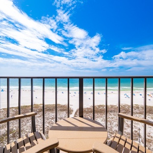 Savor the coastal vibe from your balcony, soaking in expansive views and the sounds of beach fun below