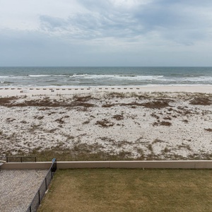 Gaze at the tranquil waters and enjoy the gentle sounds of the waves from your comfortable outdoor balcony