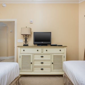 Enjoy cozy evenings watching the TV, surrounded by inviting decor in this restful guest suite