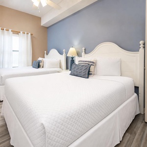 Drift into restful nights in this queen guest suite, enjoying the soft glow from the lamp illuminating your cozy retreat