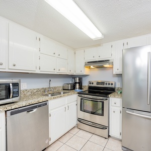 Cook up delicious family favorites in the bright kitchen, where stainless appliances and granite countertops await