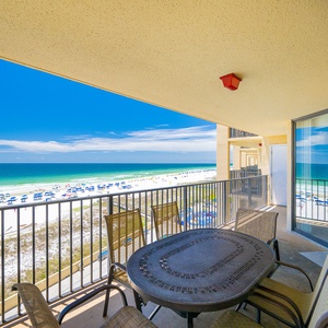 Relish your morning coffee on the balcony as turquoise waters ripple softly beneath a clear blue sky