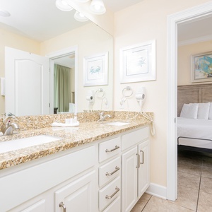 Freshen up in this guest bath in the relaxing shower or soothing tub before an exciting beach day