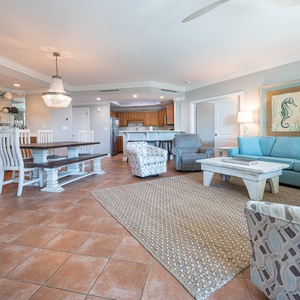 Relax in the cozy living room with a queen sofa sleeper, enjoying inviting decor while connecting with loved ones