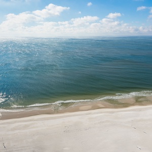 Where the sand meets the waves and the water meets the sky is where you need to be