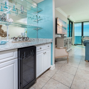 Unwind in the inviting living area, featuring a large TV and panoramic views that enhance your relaxation experience