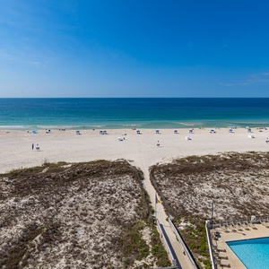 Savor the coastal views from your balcony while enjoying the serene beach vibe and calming ocean sounds