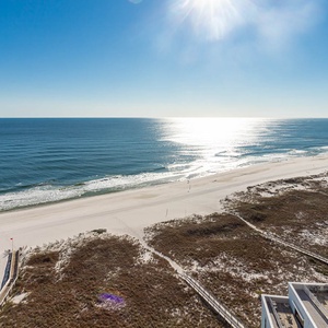 Experience seemingly endless coastline views of the horizon as waves lap the shore and the sun glistens over the water