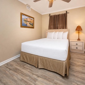 Rest easily in the queen guest suite where gentle lamp light sets a calm and peaceful mood