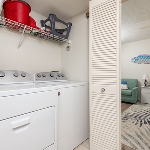 Discover the convenience of an in-unit laundry area, perfect for refreshing your beachwear during your stay