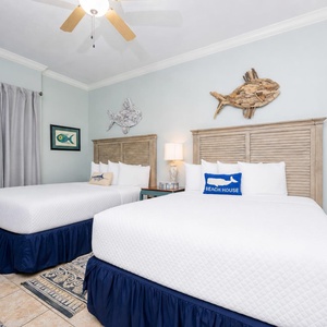 Retreat to this queen guest suite with soft beds inviting you to relax and recharge after beachside adventures