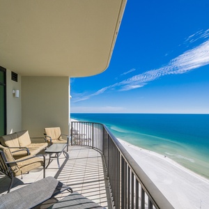 Watch the coastline stretch into the distance and the horizon meet the sky from your balcony while you soak up the sun