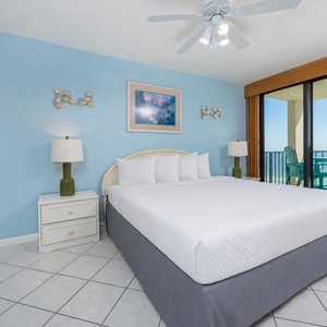 Sink into your king master suite's plush bed after a moment to watch the waves from your balcony