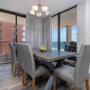 Dine with a beach view as you enjoy meals at the table, surrounded by natural light and coastal breezes