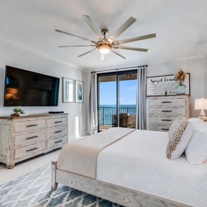 Relax in this inviting master suite featuring a king bed, stylish decor, and a view that enhances your stay