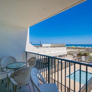 Sip morning coffee on your balcony as you take in the refreshing beach vibes and serene pool views