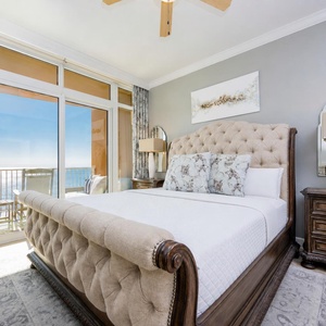 Fall into plush comfort in the king master suite, where calming beach views invite relaxation and rejuvenation