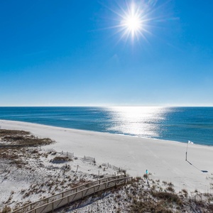 Gaze at the endless shoreline and sparkling waters, perfect for peaceful moments and beachside adventures