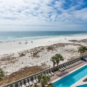 Experience seemingly endless coastline views of the horizon as waves lap the shore and the sun glistens over the water