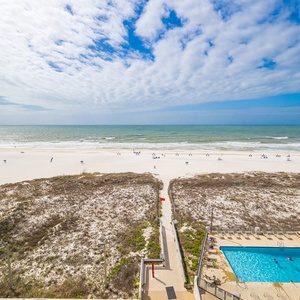 Gaze at mesmerizing coastal views from your balcony while enjoying the soothing sounds of the waves