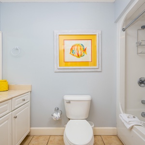 Refresh and rejuvenate in the inviting bathroom, where soft towels and cheerful decor enhance your morning routine