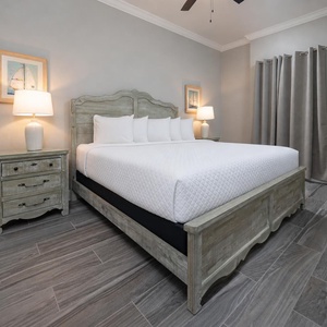 Retreat to the king master suite with cozy bedding and drift off into a peaceful slumber