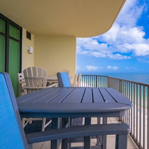 Sip your favorite drink at the balcony table, soaking in the coastal vibe and breathtaking beach views