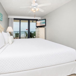Sink into the soft king bedding as you enjoy a movie in the master, with the sights and sounds of the coast