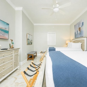 Relax in this inviting bedroom while streaming your favorite show and drift off for a peaceful retreat