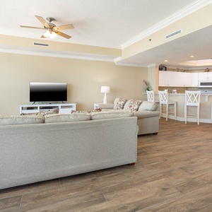 Unwind on the plush seating, streaming your favorite shows, while enjoying the warm coastal vibe around you