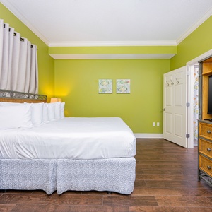 Relax on the cozy king bed in this guest suite and stream your favorite shows after a fun vacation day