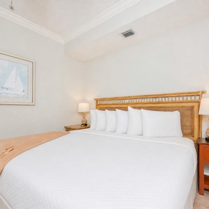 Drift into a peaceful slumber on the plush king bed in the guest suite for restful nights