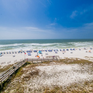 Watch the coastline stretch into the distance and the horizon meet the sky from your balcony while you soak up the sun