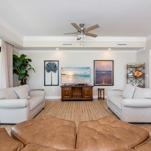 Relax on soft seating, enjoying shared moments in this living space with two sleeping chairs and a cozy sofa