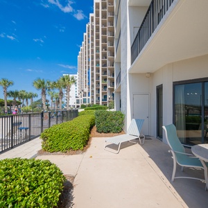 The patio opens directly to the pool area and offers the perfect outdoor retreat