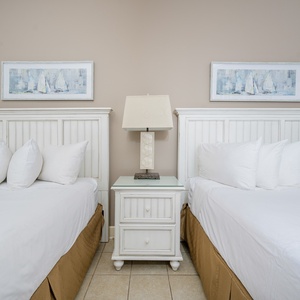 Relax in this queen guest suite, where family bonding and restful nights await in comforting surroundings