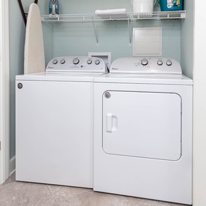 Effortlessly refresh your beach attire with the in-unit laundry, making your vacation convenient and carefree