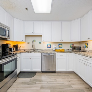 Create delicious meals in your spacious kitchen, surrounded by playful artwork that adds a cheerful vibe