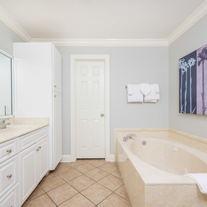 Indulge in a relaxing soak in the jetted tub in the master, rejuvenating your senses after beach adventures