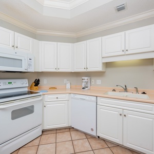 Prepare your favorite meals with ease in this kitchen, enjoying the convenience of a spacious design