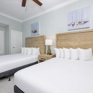 Relax on one of the cozy queen beds in this guest suite and enjoy a peaceful slumber
