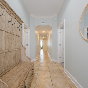 Greet your beach days in this charming foyer, where a cozy bench welcomes you home after sun-soaked adventures