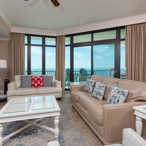 Relax on the cozy sofa with a queen sleeper in this inviting family room with breathtaking beachfront views