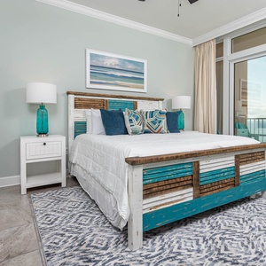 Walk onto the balcony from the king master suite to feel gulf air and gaze across the beach and horizon