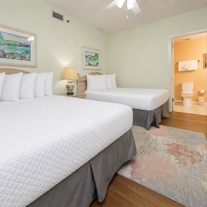 Relax on one of the cozy double beds in this guest suite and enjoy a peaceful slumber